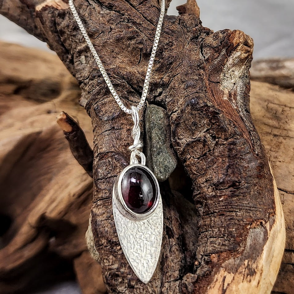 Garnet Oval on Teardrop Silver Pendant