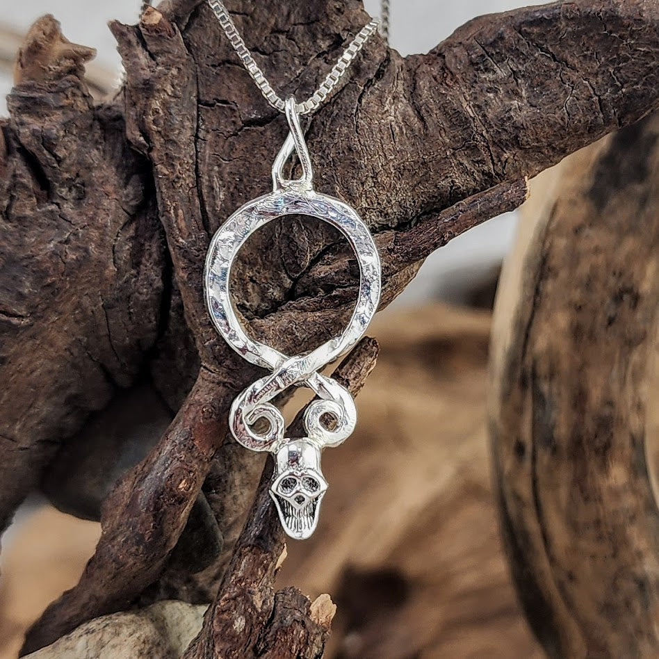 Troll Cross with Tiny Skull