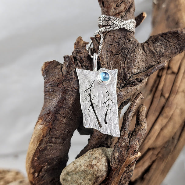 Whimsical Two Tree Pendant - Topaz