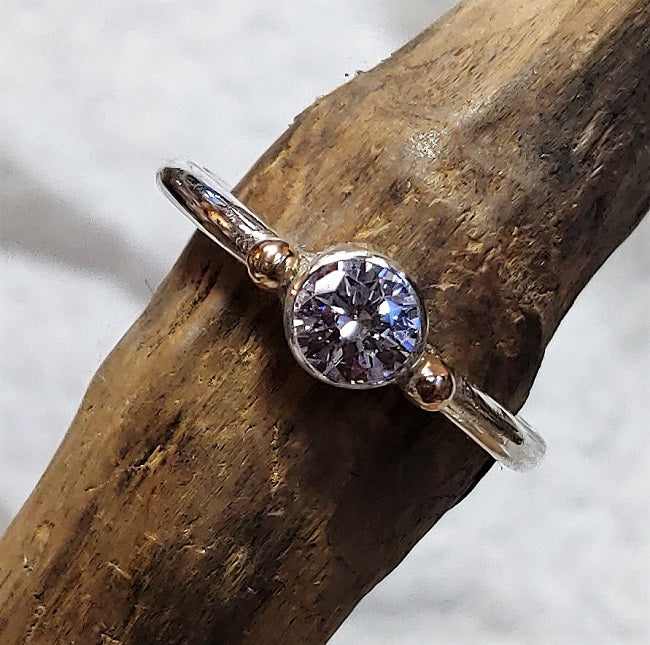 Sterling and 10k gold CZ band ring