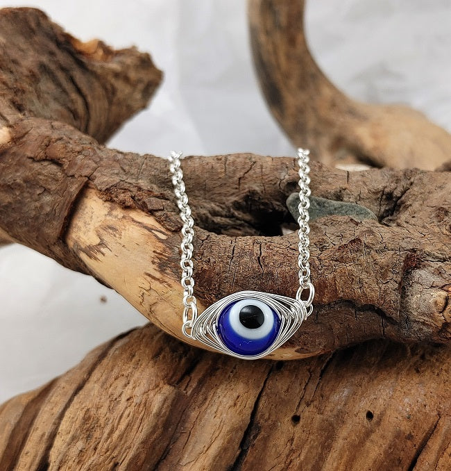 Evil Eye pendant - silver herringbone wrap