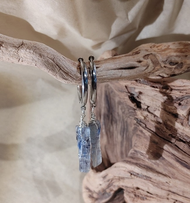Raw kyanite - organic silver wrap on hinged stainless steel hoop