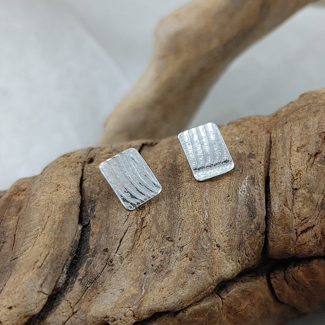 Roll print silver studs