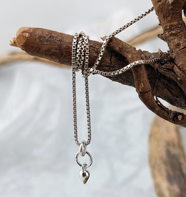 Minimalist silver pear drop necklace