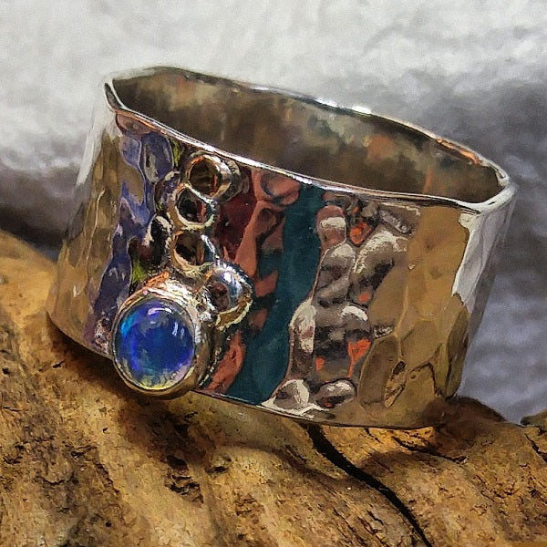 Wide organic band ring with brass overlays and 4mm Blue Opal